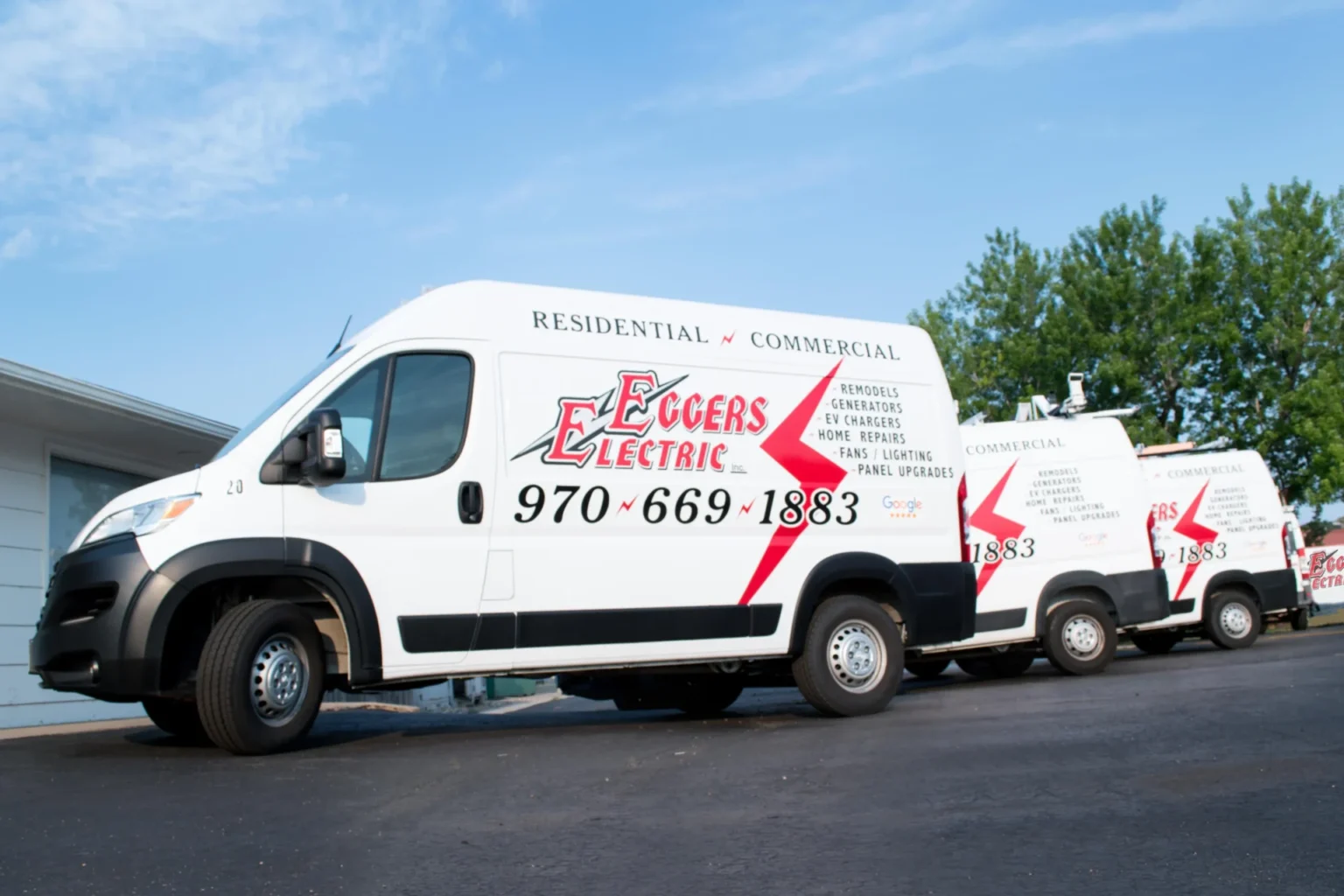 Eggers Electric service vans parked at the Loveland shop
